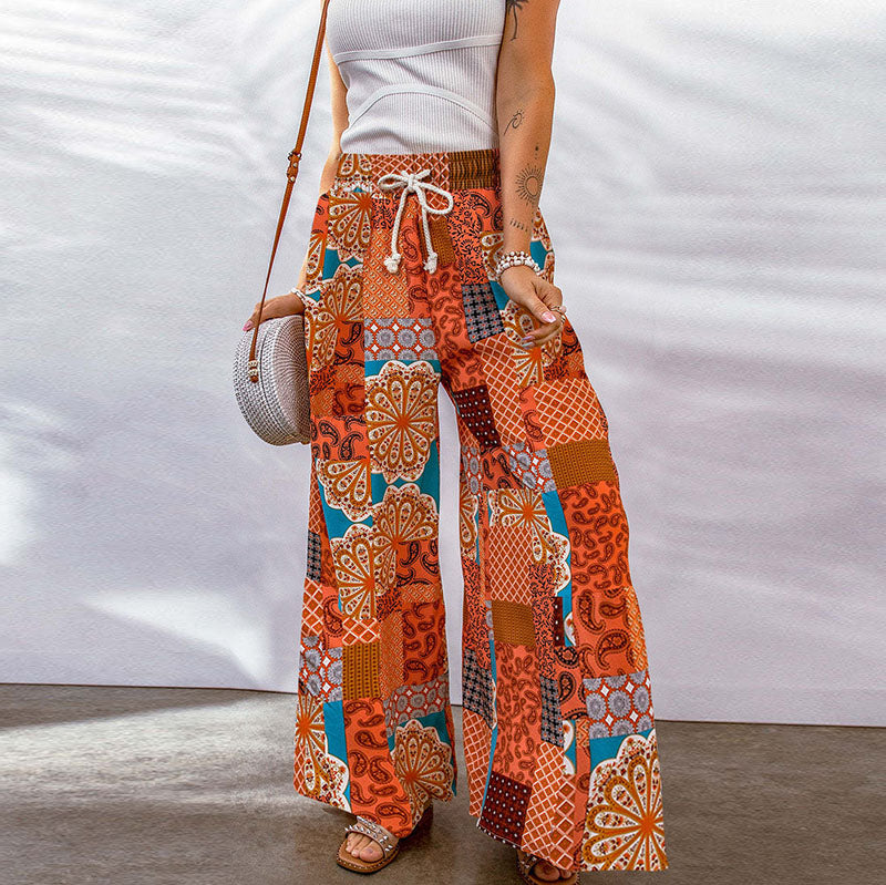 Pantalones casuales de pierna ancha y holgados con estampado de flores pequeñas para mujer
