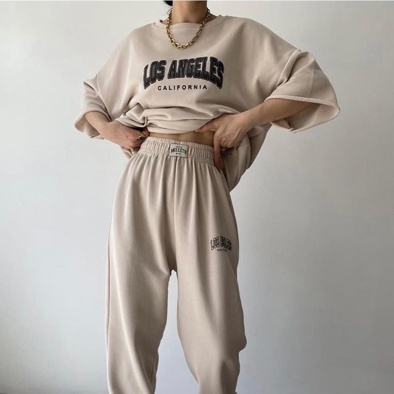Conjunto de sudadera y pantalones de manga corta con estampado de letras y nombre de ciudad para mujer