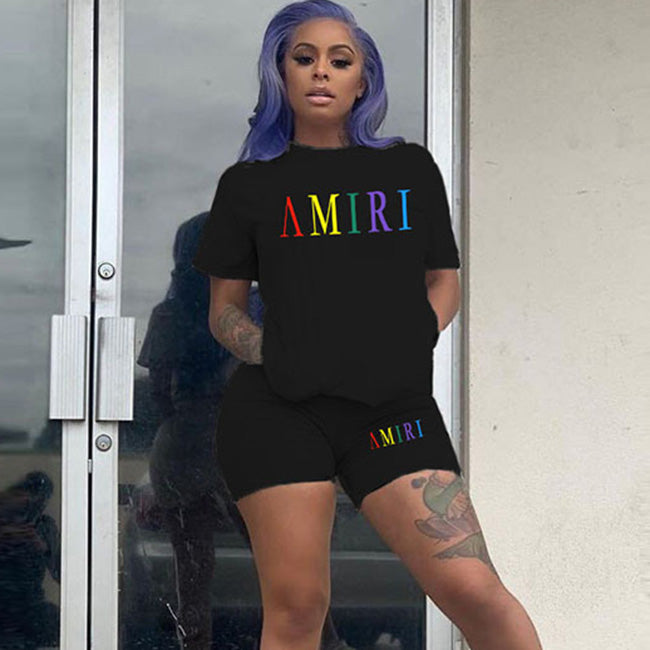 Conjunto de 2 piezas de pantalones cortos ajustados de manga corta con cuello redondo y estampado de letras de color sólido para mujer
