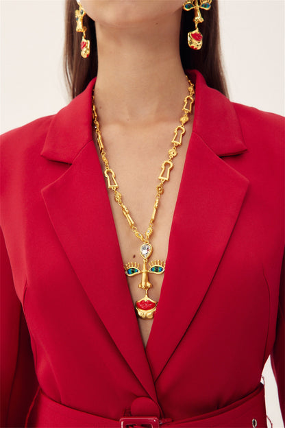 Collar retro con cara de mal de ojo