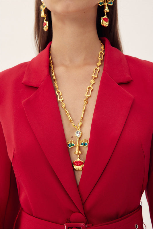 Collar retro con cara de mal de ojo