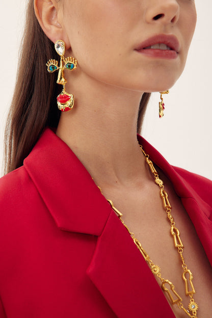 Pendientes retro con cara de mal de ojo