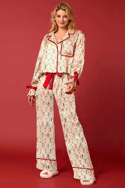 Conjunto largo de pijama con personajes navideños Sprint