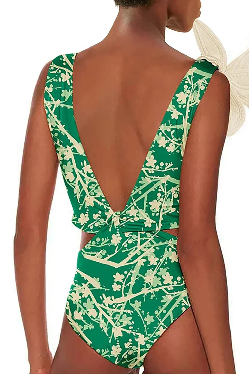 Traje de baño de una pieza con estampado verde y apliques florales