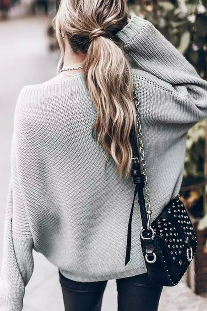 Conjunto de suéter de punto extragrande con mangas murciélago y minifalda con volantes
