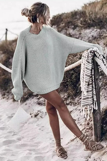 Conjunto de suéter de punto extragrande con mangas murciélago y minifalda con volantes