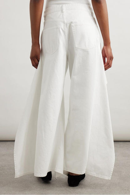 Vaqueros de tiro medio y pierna ancha con volantes