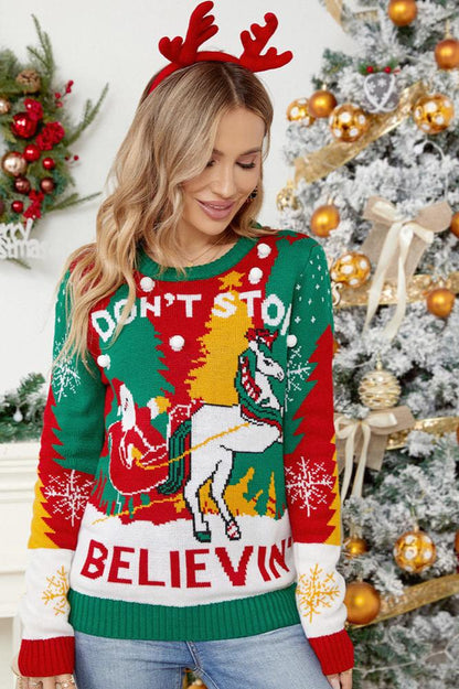 SUÉTER DE PUNTO CON TRINEO DE PAPÁ NOEL Y RENO 