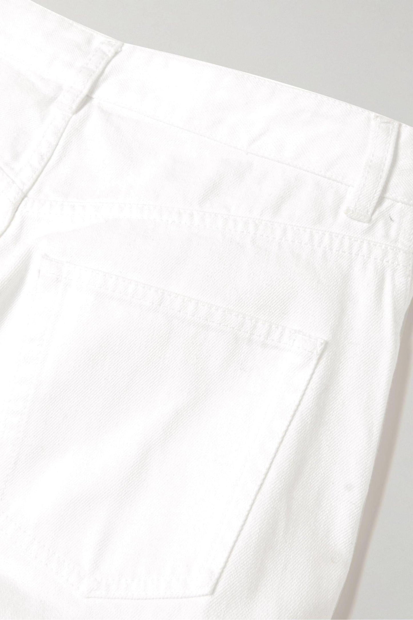 Vaqueros de tiro medio y pierna ancha con volantes