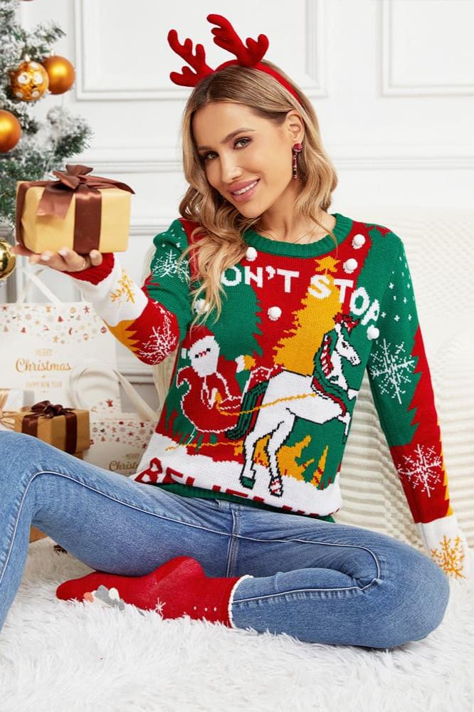 SUÉTER DE PUNTO CON TRINEO DE PAPÁ NOEL Y RENO 