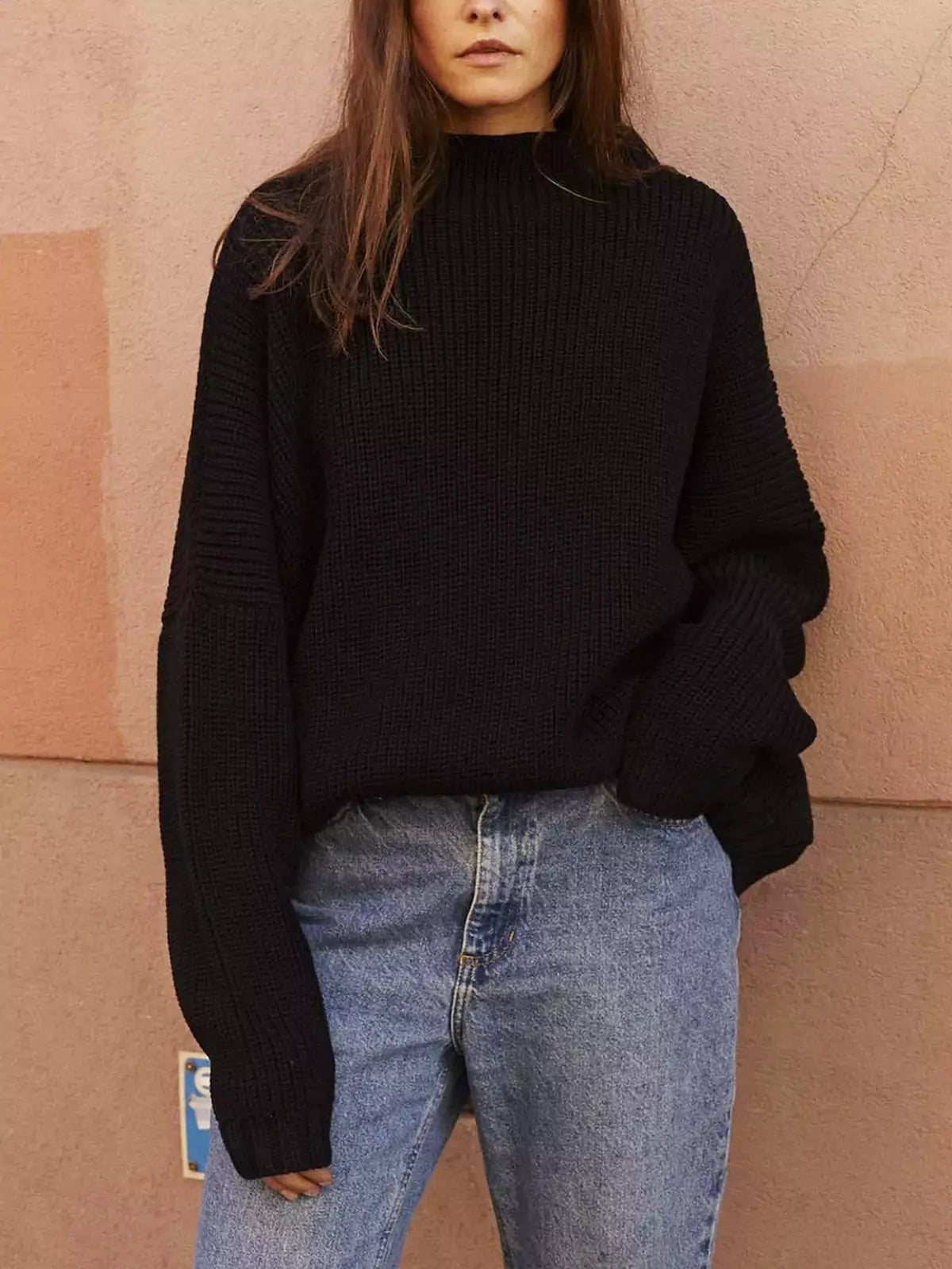 Conjunto de suéter de punto extragrande con mangas murciélago y minifalda con volantes