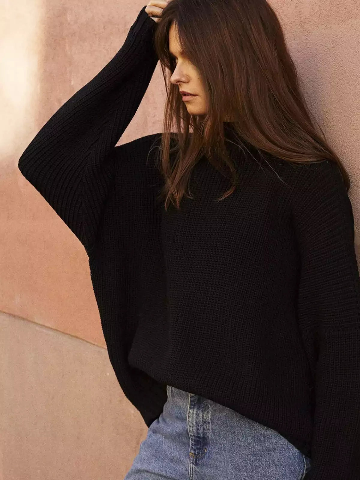 Conjunto de suéter de punto extragrande con mangas murciélago y minifalda con volantes