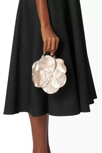 Bolso de mano de piel sintética con diseño floral