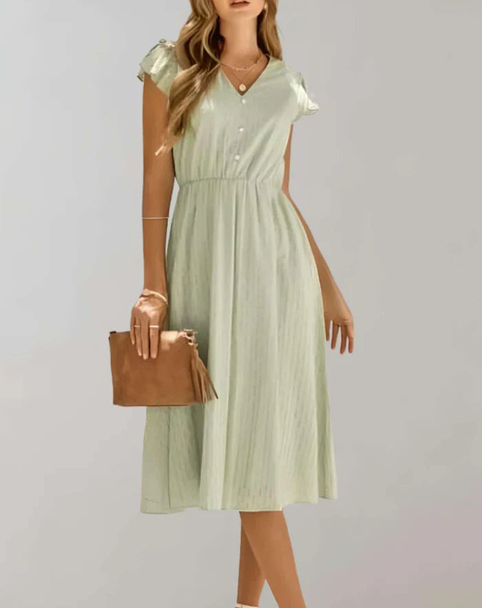 Vestido de mujer con mangas mariposa y volantes texturizados | Ideal para primavera/verano