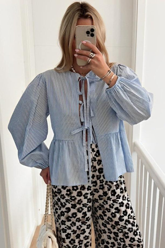 Blusa con lazo y rayas