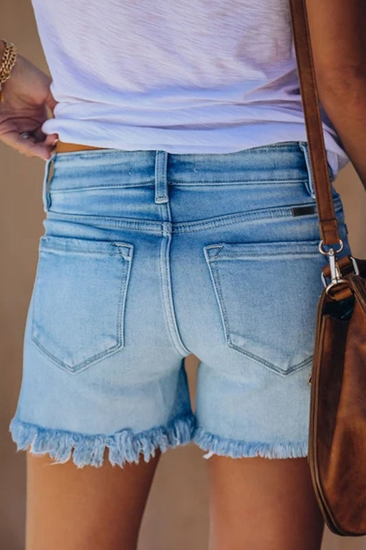 Shorts vaqueros lisos con flecos