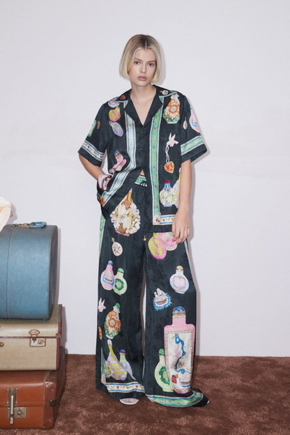 Conjunto de pantalones con estampado de floreros y cuello en V Philomène