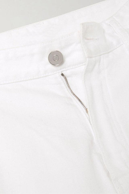 Vaqueros de tiro medio y pierna ancha con volantes