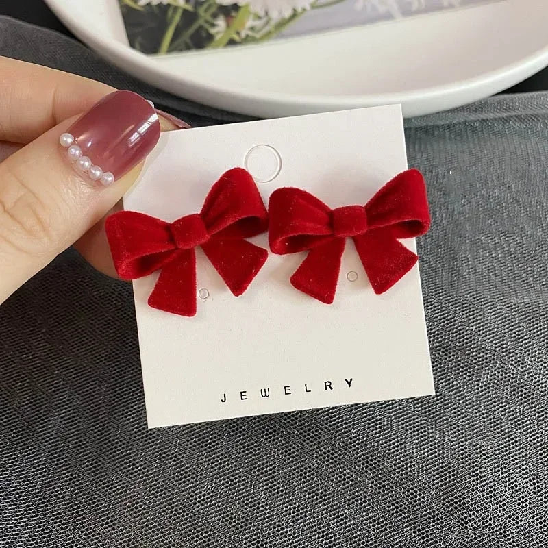 LIZAKOSHT Winter Pearl Bowknot Stud Earrings for Women Happy New Year Gift Jewelry