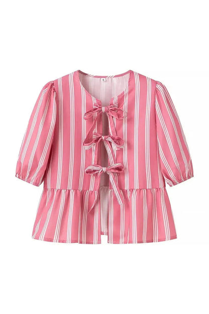 Blusa de rayas con mangas abullonadas y lazos peplum
