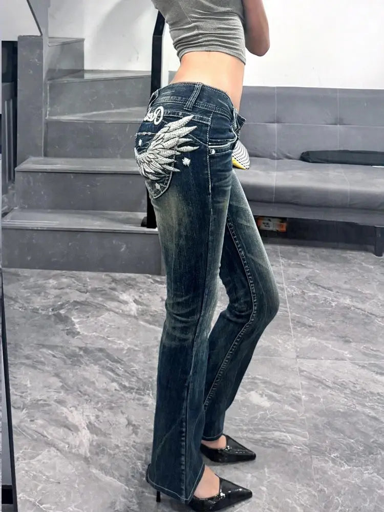 Wing Embroidery Flare Pants