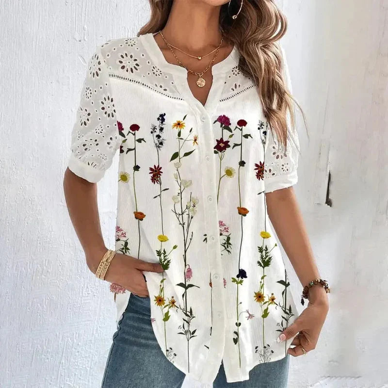 Blusa elegante de mujer con cuello en V, manga corta y ojales con estampado floral | Ideal para primavera/verano