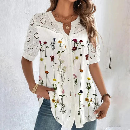 Blusa elegante de mujer con cuello en V, manga corta y ojales con estampado floral | Ideal para primavera/verano