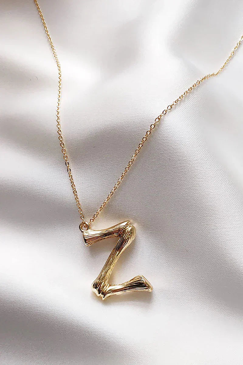 Collar con inicial UZ