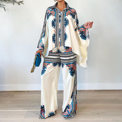 Conjunto de dos piezas de blusa y pantalones holgados con mangas murciélago y estampado informal de verano para mujer