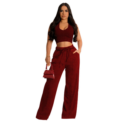 Conjunto de dos piezas de camiseta sin mangas y pantalones anchos de color liso para mujer