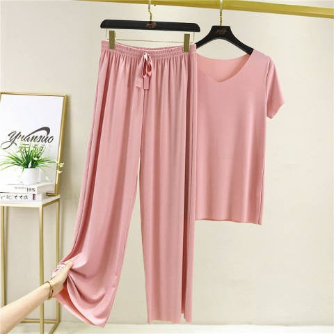Conjunto de dos piezas de camiseta y pantalón de seda helada de color liso informal para mujer