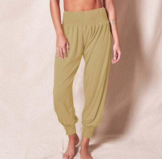 Pantalones deportivos casuales de cintura elástica de color sólido a la moda para mujer