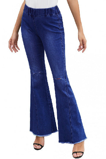 Vaqueros rasgados, holgados, acampanados y de color liso, informales, a la moda para mujer