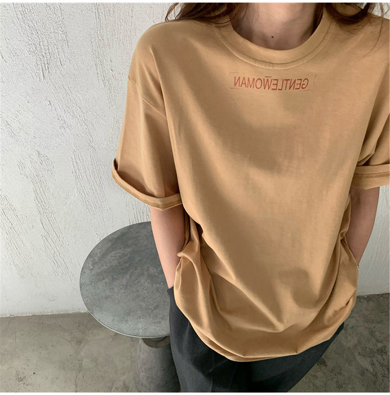 Camiseta informal de manga corta con cuello redondo y estampado de letras en color liso para mujer