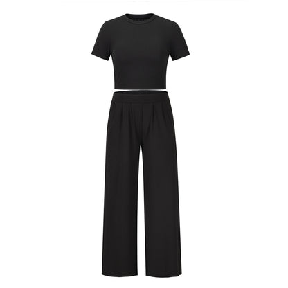 Conjunto de dos piezas de top de manga corta y pantalón ancho de color liso informal de verano para mujer