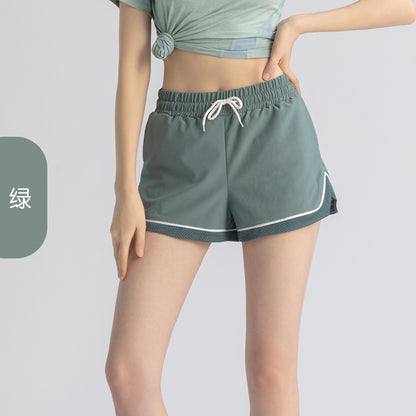 Pantalones cortos deportivos informales para correr, elásticos, antidecoloración, de dos piezas, sueltos y falsos para mujer