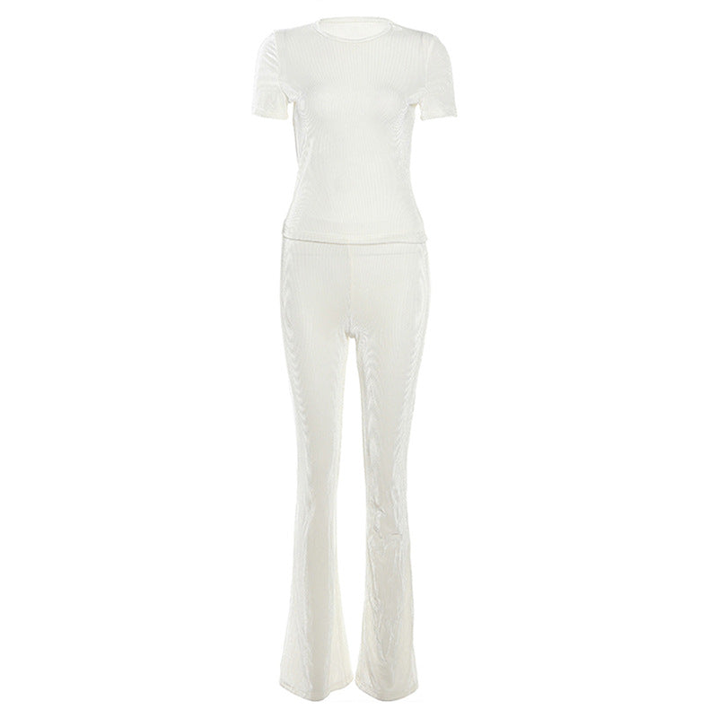 Conjunto de dos piezas formado por top y pantalón de manga corta, cuello redondo, color liso, informal, a la moda para mujer