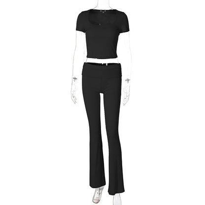 Conjunto de dos piezas de top corto y pantalones de manga corta con cuello redondo y color liso para mujer de verano