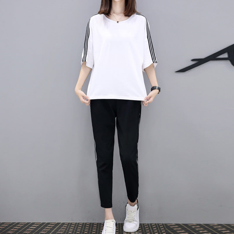 Conjunto de dos piezas de top y pantalón de manga corta con cuello redondo y rayas informales a la moda para mujer