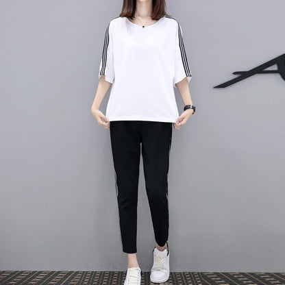 Conjunto de dos piezas de top y pantalón de manga corta con cuello redondo y rayas informales a la moda para mujer