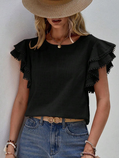 Blusas casuales de color sólido con cuello redondo y volantes para mujer