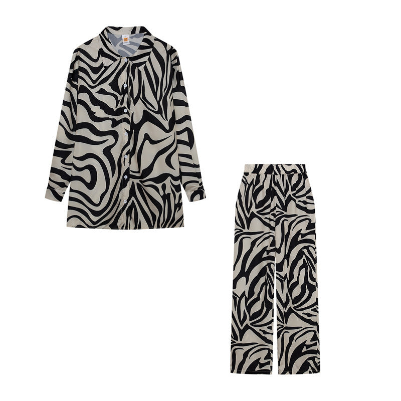 Conjunto de blusa y pantalón de manga larga con estampado de rayas informales a la moda para mujer