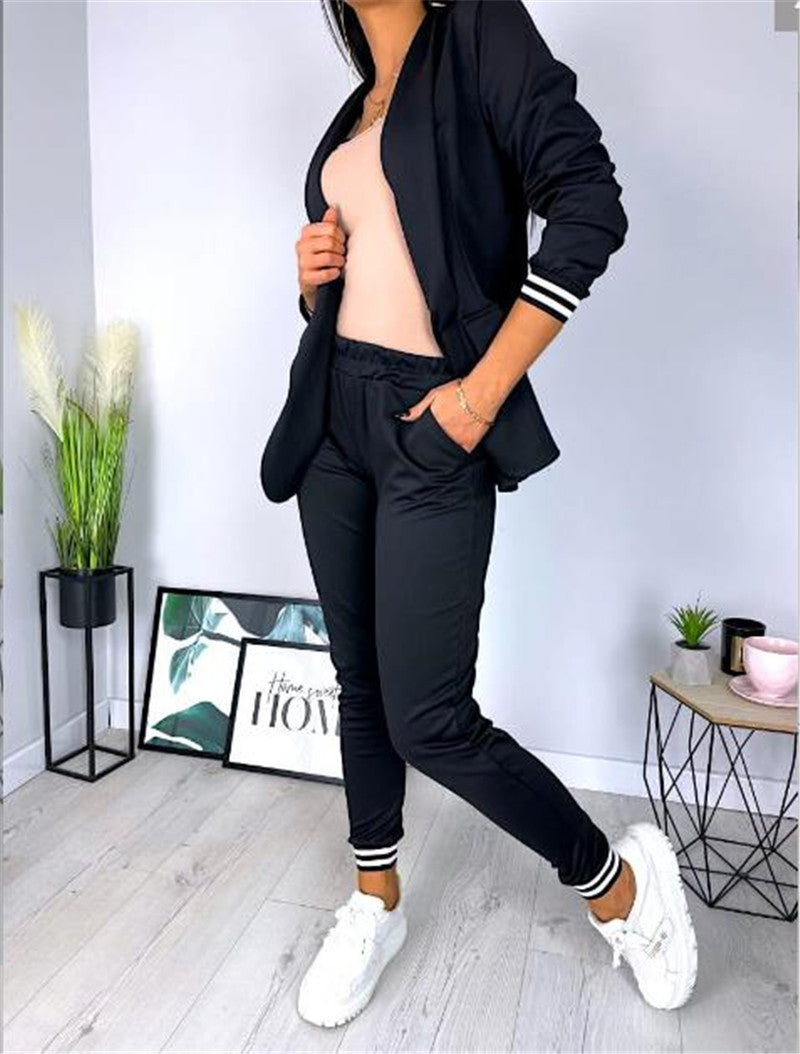 Conjunto de dos piezas formado por chaqueta y pantalón, manga larga, color liso, informal, a la moda para mujer