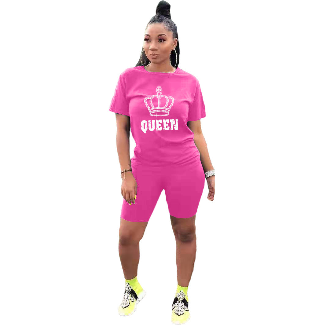 Conjunto deportivo informal de dos piezas para mujer: camiseta de manga corta con cuello redondo y pantalones cortos de color liso