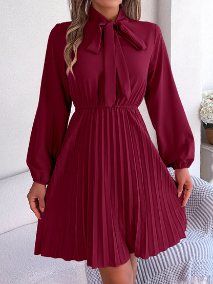 Vestido plisado informal de manga larga con cintura definida y cordones para mujer