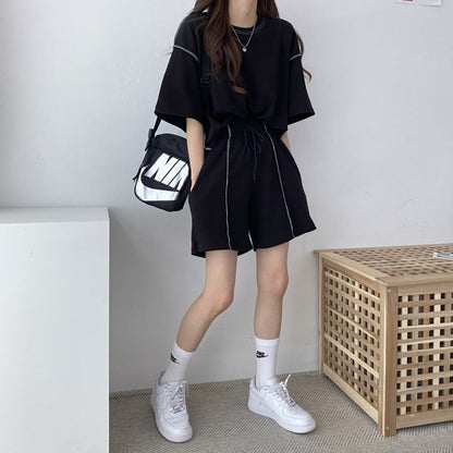 Conjunto deportivo informal de dos piezas para mujer: camiseta de manga corta con cuello redondo y pantalones cortos holgados