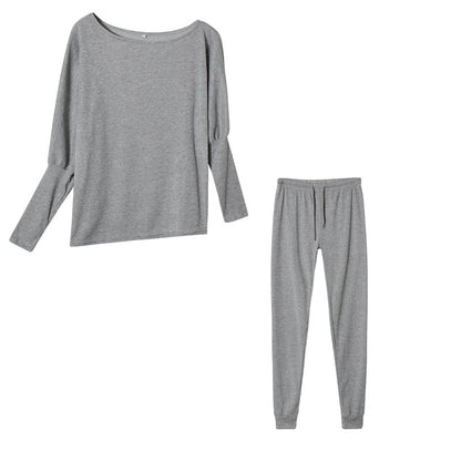 Conjunto de dos piezas formado por top y pantalón ajustado, manga larga, hombros descubiertos, color liso, informal, a la moda para mujer