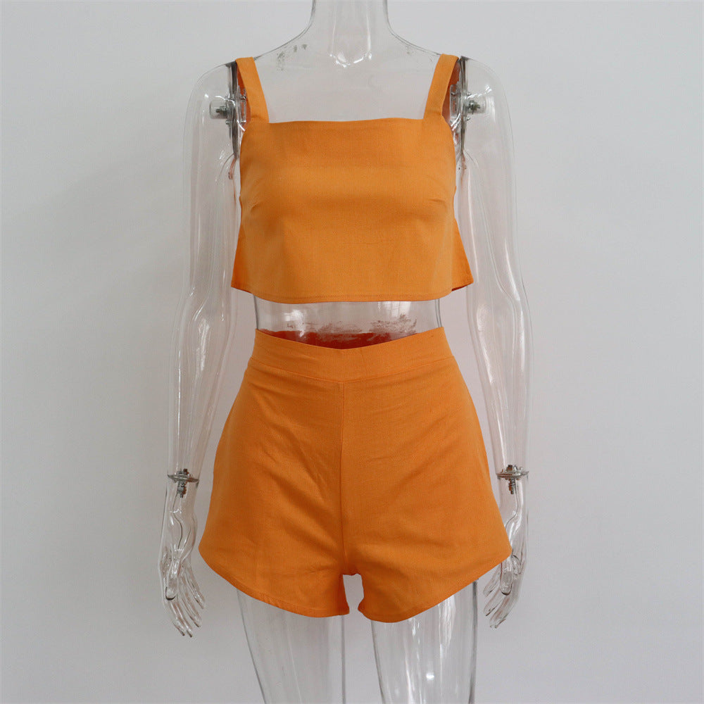 Conjunto de dos piezas de camiseta sin mangas y pantalones cortos de color liso para mujer