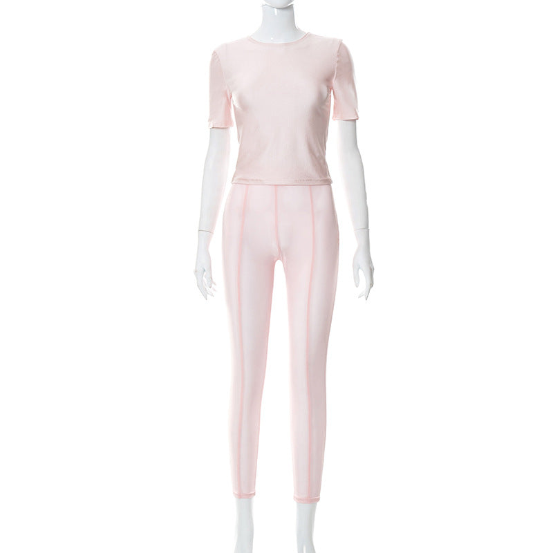 Conjunto de dos piezas para mujer: camiseta de cuello redondo de color liso y pantalón de malla informal que realza la cadera