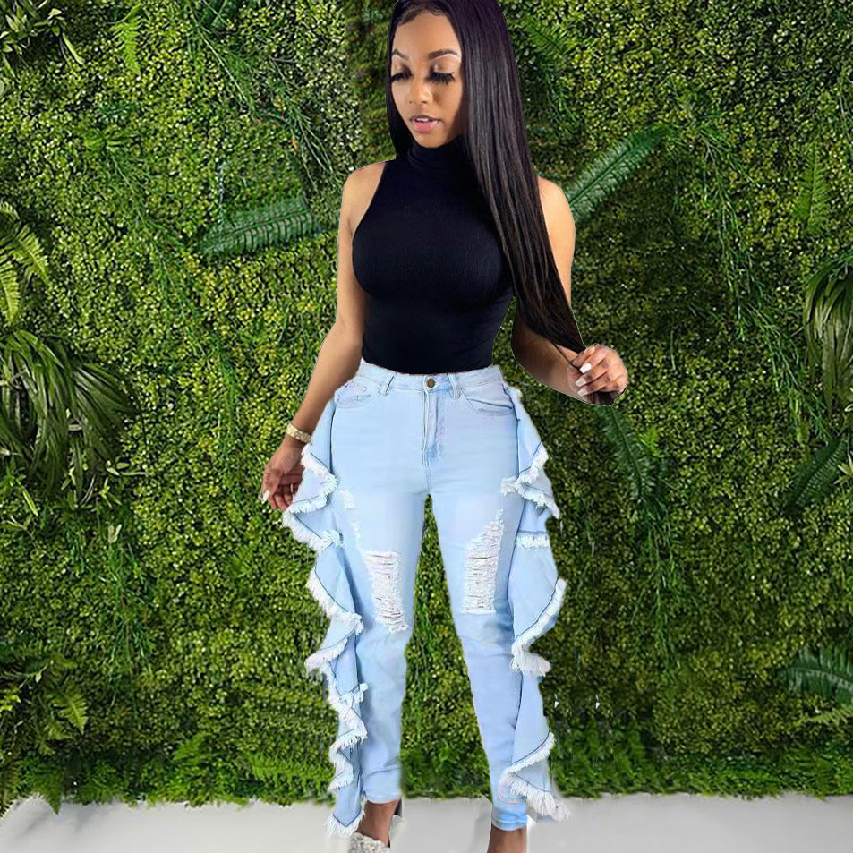 Vaqueros ajustados con borlas y volantes rotos para mujer
